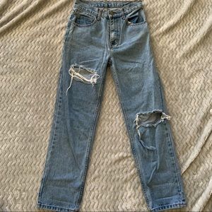 Distressed light/ medium wash jeans